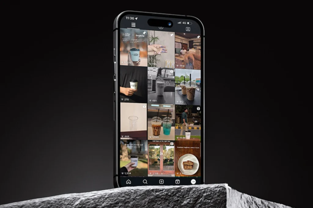 Smartphone showing collage of posts — social media management and strategy service by Flinzap